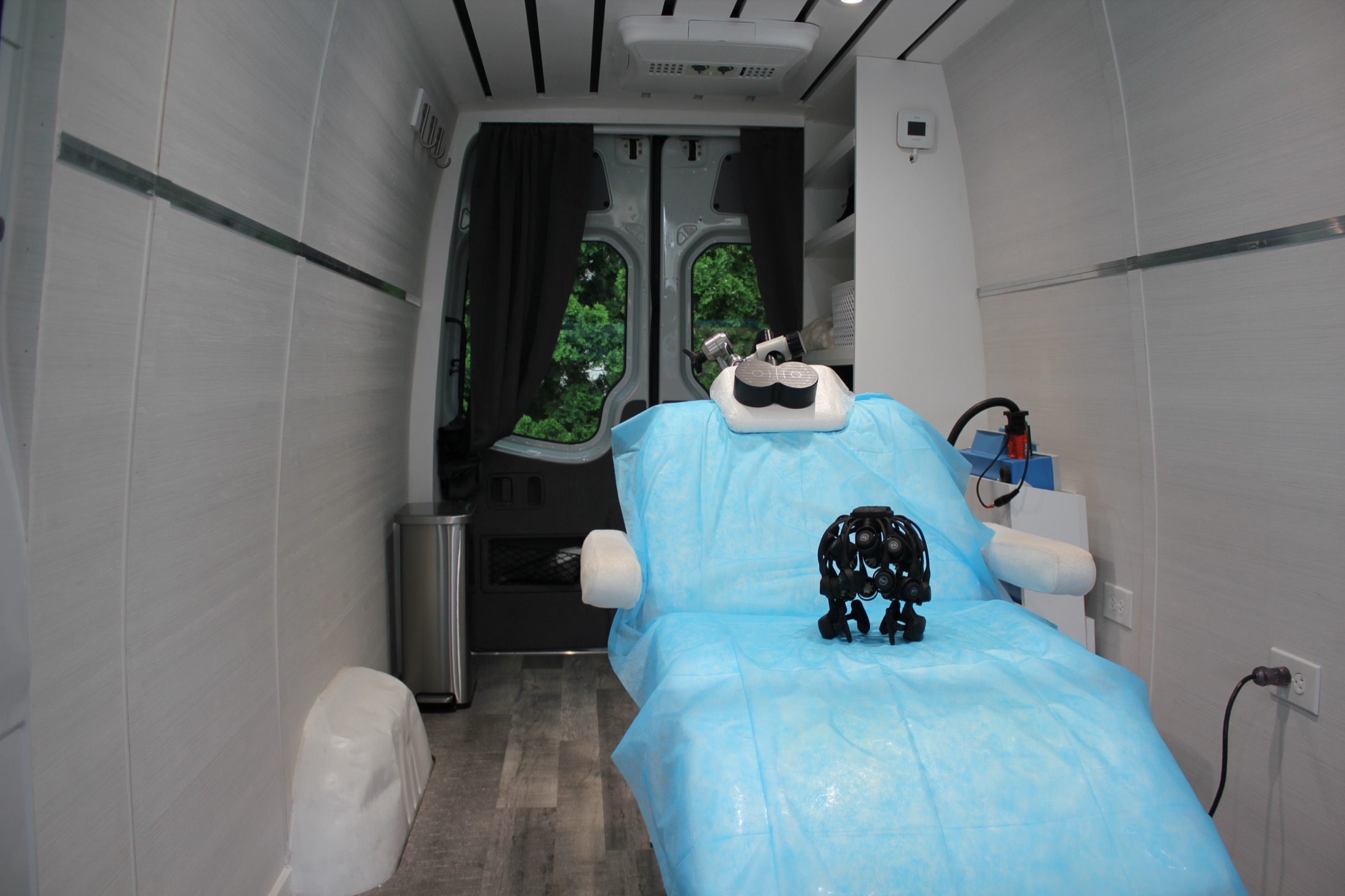 EEG equipment and treatment chair inside the mobile clinic